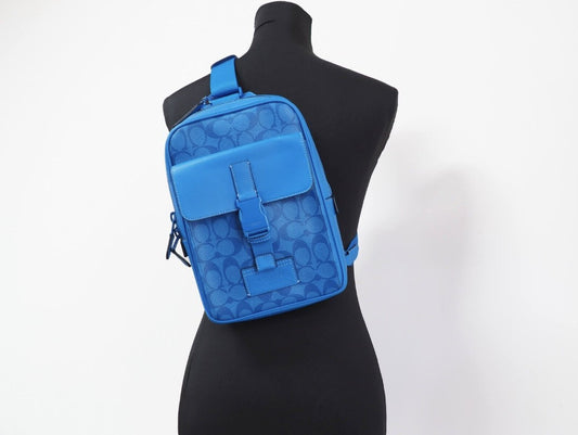 (C9838) Bright Blue Signature Coated Canvas Track Pack Slingpack Backpack
